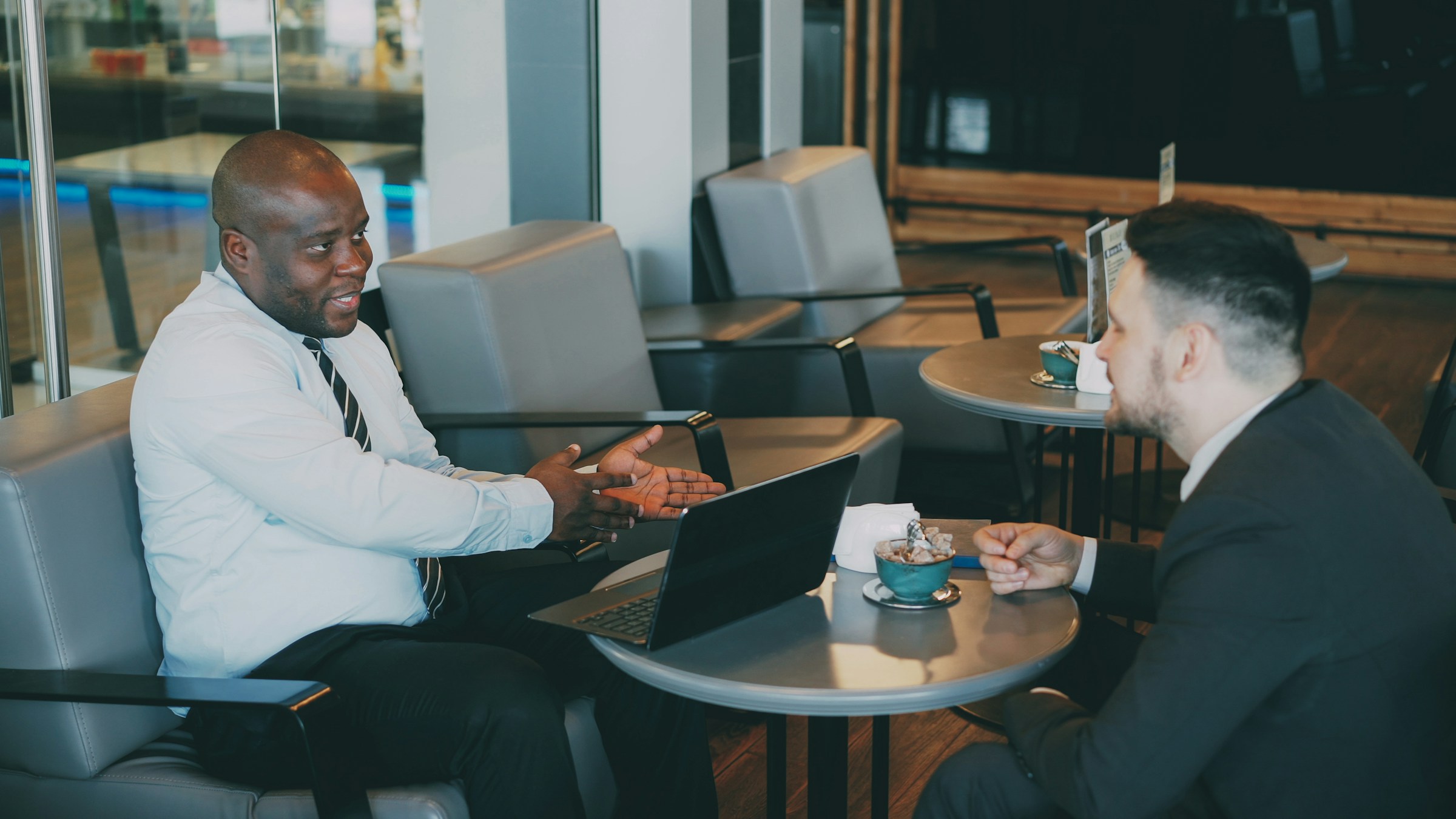 male nurse having a coffee with recruiter